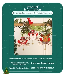 Detail of fabric Christmas ornaments with snowman, deer and Santa under pine branches