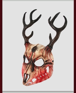 Detailed side view of realistic deer bone mask with antlers and blood splatter details