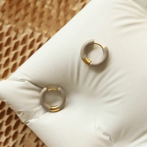 French style 18K gold plated hoop earrings with khaki enamel finish on soft white texture