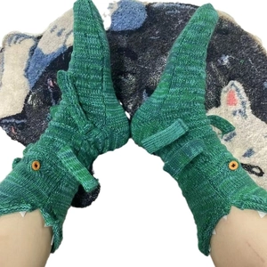 Funny green knitted crocodile socks with handmade 3D teeth and button eyes