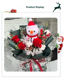Christmas bouquet gift set with red roses, snowman doll, pine cones and festive ornaments