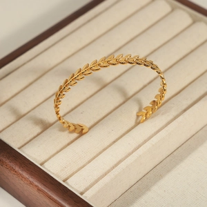 Elegant gold plated wheat leaf open bangle with detailed vintage leaf texture