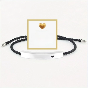 Handwoven black rope bracelet with silver bar featuring Just Breathe engraving and card