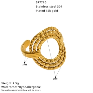 Detail view showing 21mm star design and 3mm band width on gold plated stainless ring