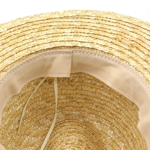 Natural straw sun hat with adjustable inner drawstring and moisture-wicking sweatband