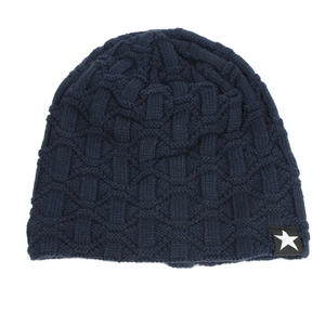 Close-up of navy blue knit beanie with basket-weave texture and star embroidery detail