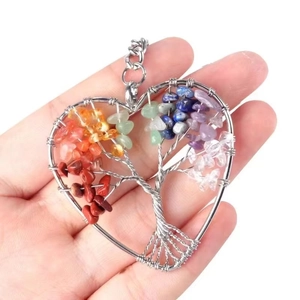 Tree of Life heart keychain with colorful natural chakra stones held in hand