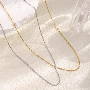 Minimalist 1.4mm stainless steel cross chain necklaces in gold and silver plating