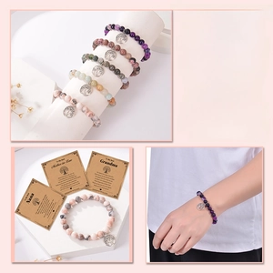 Detail of tree of life charm bracelets with colorful natural stones and gift card