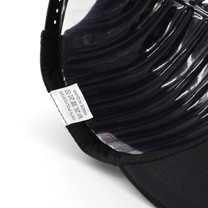 Detail view of the 100% polyester lining and plastic snapback closure of the hip hop cap