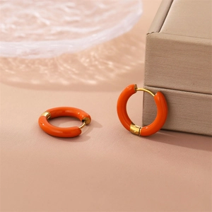 Fashionable golden hoop earrings with orange enamel coating for summer holiday style