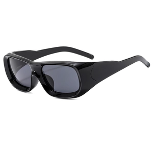Modern black square frame oversized sunglasses with dark grey lenses on white background