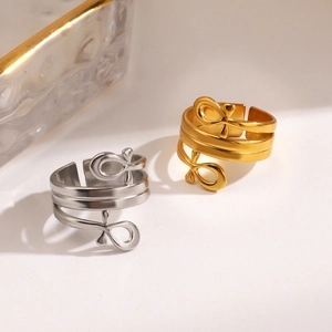 Cross knot stackable rings in gold and silver finish made of high-quality stainless steel