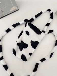 Plush cow print water bottle bag with crossbody strap for school and daily use
