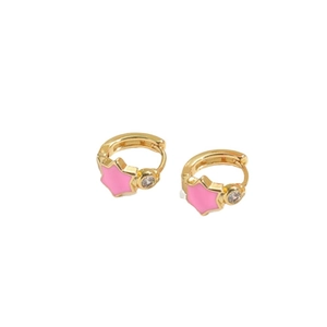 Chubby gold hoop earrings featuring pink star pendant and sparkling crystal stone