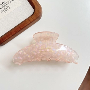 Pink iridescent hair claw with acetate fish scale texture and gold La France lettering