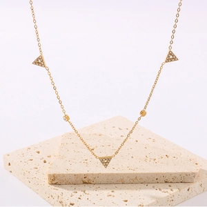 Elegant gold-tone stainless steel necklace with three pavé triangle charms and tiny beads