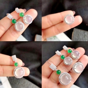 Detail shots of elegant jewelry set featuring translucent green jadeite and silver finish