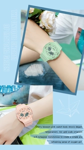 Detailed dual display wristwatches in matcha green and cherry pink with resin bands
