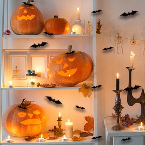 Halloween home decor set with carved pumpkins, black bat wall stickers and candles