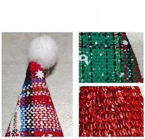 Detail of Christmas mini hat cutlery holder featuring sequined fabric and festive plaid patterns