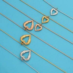 Polished stainless steel hollow heart pendant necklaces in gold, silver and rose gold