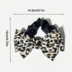 Leopard print bow scrunchie with dimensions 14.5cm by 12cm for high ponytail styling