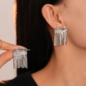 Elegant silver tassel drop earrings with sparkling cubic zirconia and long metal chains