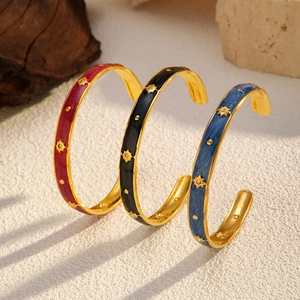 Star pattern enamel open bangles in red black and blue with 18K gold plated finish