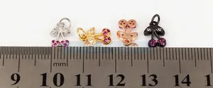 Micro-inlaid cherry pendant dimensions measured in four finishes on white scale
