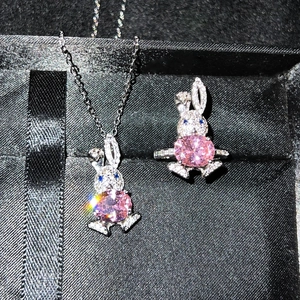 Sparkling silver rabbit jewelry set with pink stones including necklace and open ring