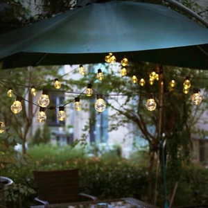 Outdoor G40 LED solar string lights with warm bulbs for garden and patio decoration