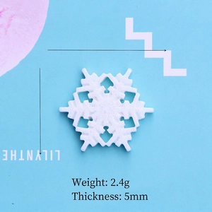 Detail view of 3.3cm white resin snowflake accessory with pink glitter for DIY crafts