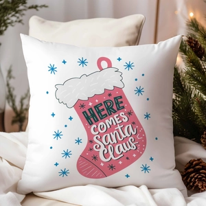 Detail of Christmas pillowcase with pink Santa Claus stocking and festive typography