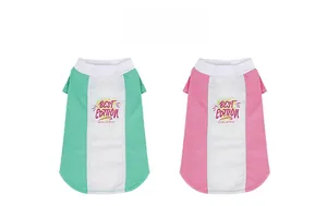 Detail of mint green and pink pet t-shirts with letter prints and color blocking design