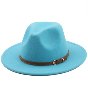 Detail of light blue wool felt fedora with brown leather belt and silver metal buckle