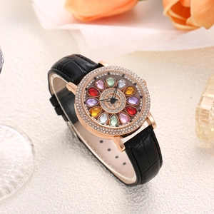 Detail of rose gold case watch with crystal floral dial and black leather strap