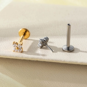 Titanium flower labret stud with cubic zirconia in gold and silver plating finish