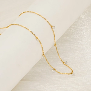 Elegant 18k gold titanium steel necklace with sparkling round zircon crystals on silk
