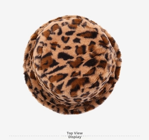 Top-down view of a plush leopard print bucket hat with dense faux fur texture