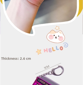 Detailed view of magenta mini slot machine keychain with 2.6cm thickness and 5cm chain