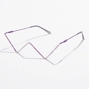 Close-up of wavy metal rimless glasses frame in dark purple with sparkling rhinestones