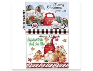 Detail of Christmas placemats with gnome and gingerbread designs in 44x34cm size