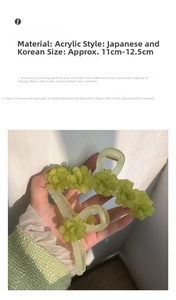 Detail shot of light green flower hair claw clip in acrylic material 11cm length