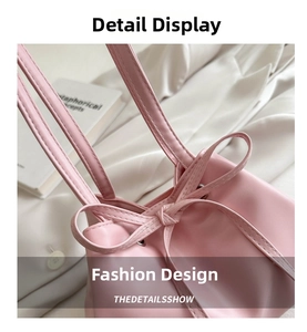 Dettaglio della borsa a secchiello rosa con fiocco a coulisse e cuciture raffinate