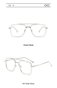 Close-up of silver metal double bridge glasses frame with diamond texture on temples