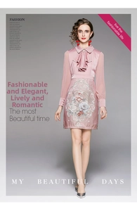 Elegant pink satin dress with floral embroidery and sheer organza sleeves details