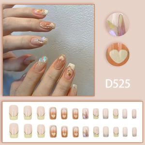 French style press-on nails with Aurora glitter heart and diamond patterns in nude pink