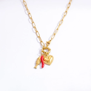 Close-up of gold chunky chain necklace with red chili, fish and heart charms