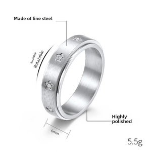 Detail view of 6mm star engraved spinning ring with zircon in polished stainless steel